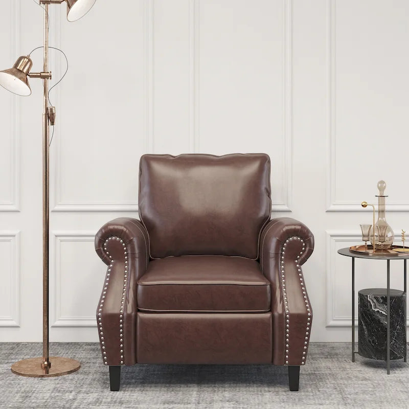 Fauteuil club en similicuir marron cognac avec cloutage et accoudoirs roulés
