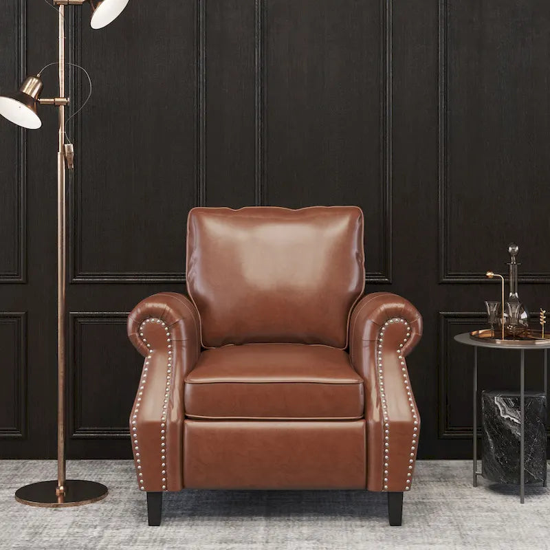 Fauteuil club en similicuir marron cognac avec cloutage et accoudoirs roulés