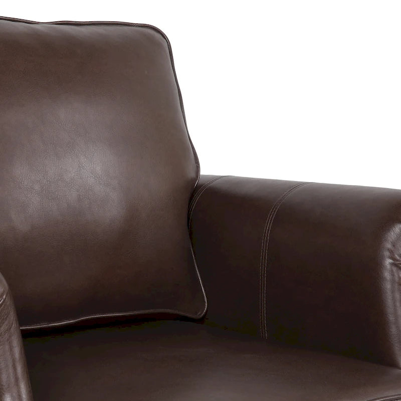 Fauteuil club en similicuir marron cognac avec cloutage et accoudoirs roulés