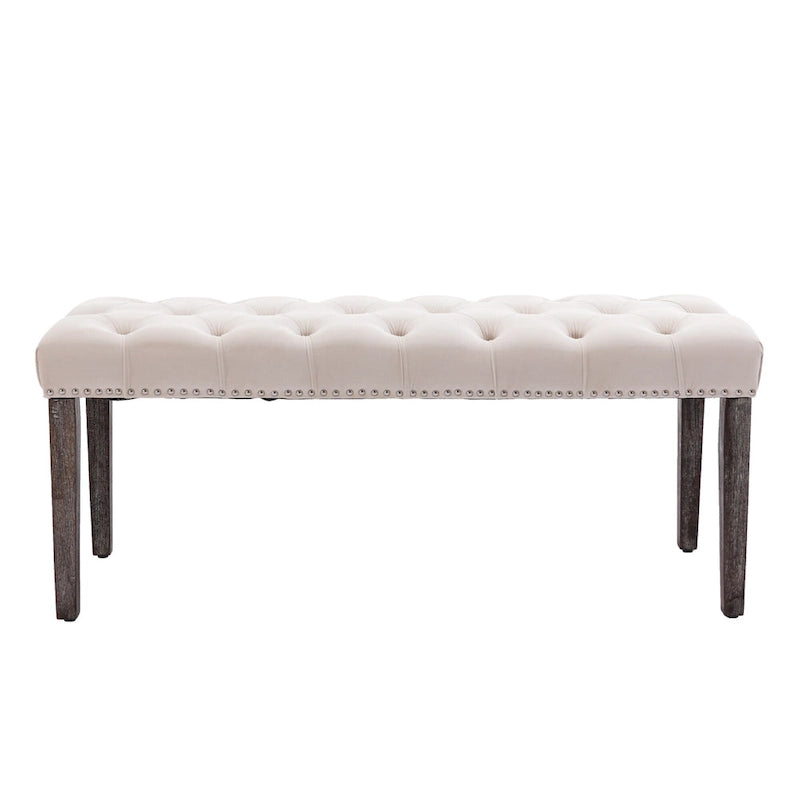 Banc capitonné en velours avec clous décoratifs et pieds en bois