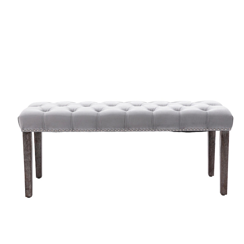 Banc capitonné en velours avec clous décoratifs et pieds en bois