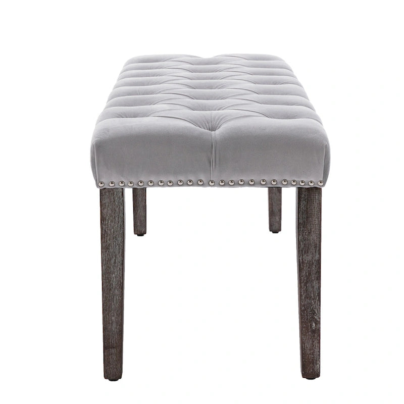 Banc capitonné en velours avec clous décoratifs et pieds en bois