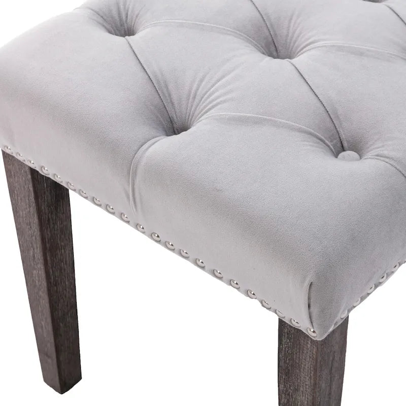 Banc capitonné en velours avec clous décoratifs et pieds en bois