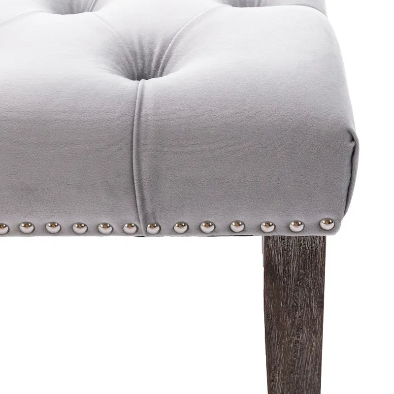 Banc capitonné en velours avec clous décoratifs et pieds en bois