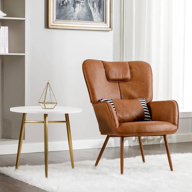 Fauteuil d'appoint à oreilles en similicuir avec coussin lombaire et pieds en métal