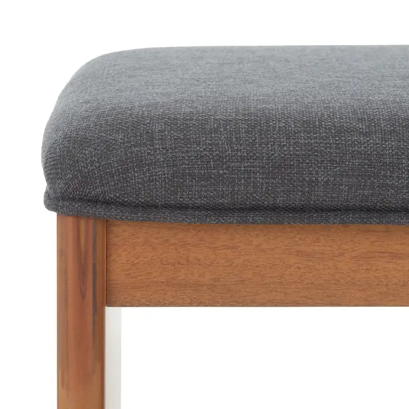 Banc rembourré avec étagère ouverte et pieds effilés en bois noir et naturel