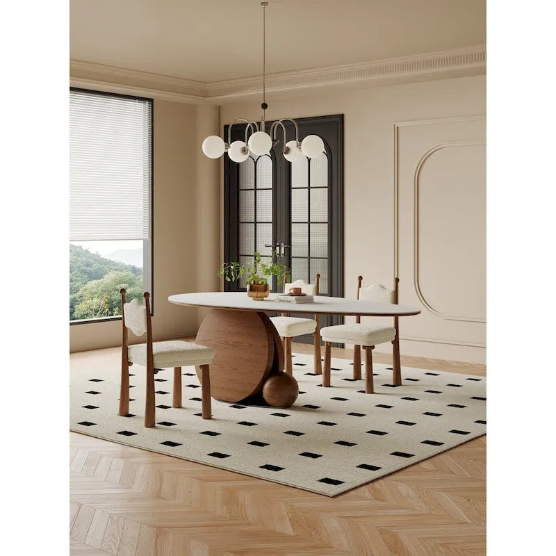 Chaise de salle à manger tapissée à rayures noires et blanches avec pieds tournés en bois massif